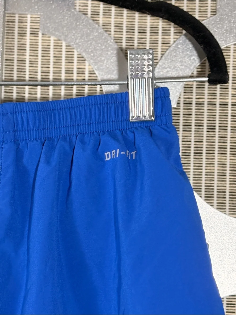 Nike Men’s Royal Blue Athletic Shorts with Gray & Navy Panels and has a snag
